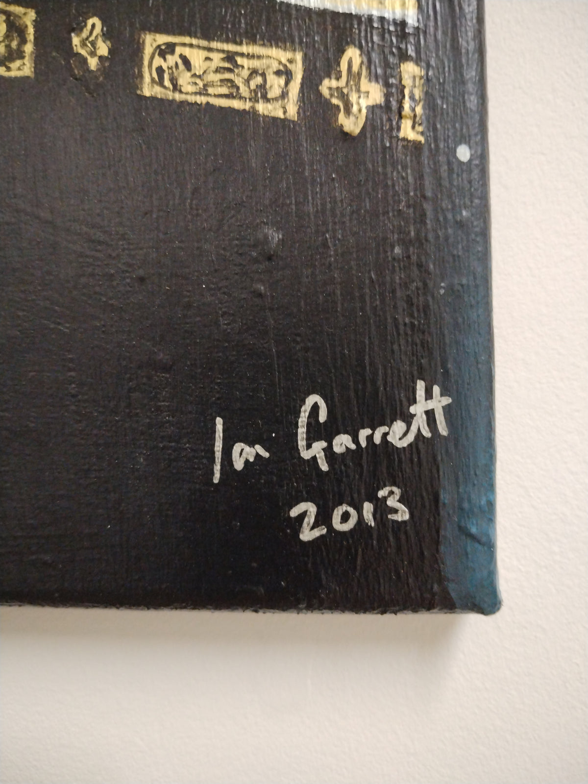 Corner detail of Lailatul Qadr (Night of Power) - Original acrylic painting on canvas. by Ian Garrett showing the artists signature.
