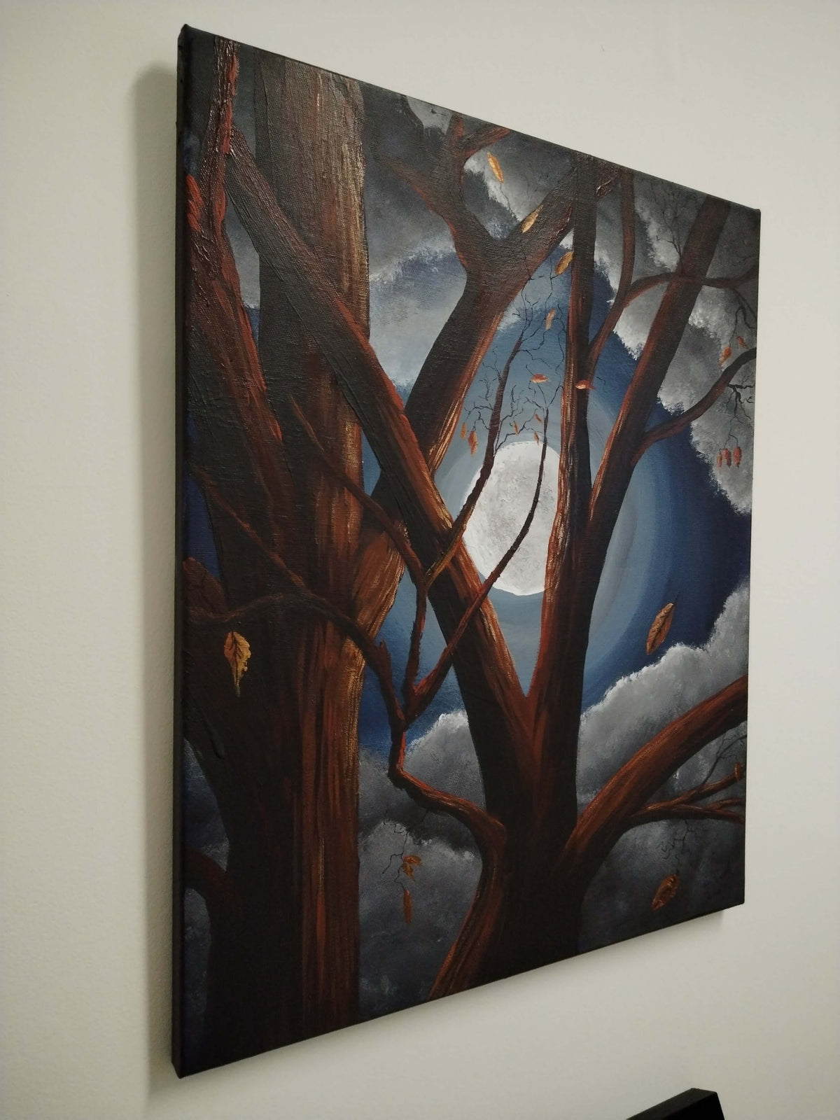 Acrylic painting 'Fall Moon' by Ian Garrett featuring a full moon shining through autumn trees.