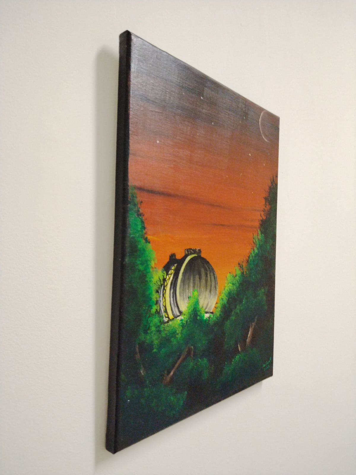 Painting of Greenwich Observatory under a new moon, surrounded by trees at sunset.