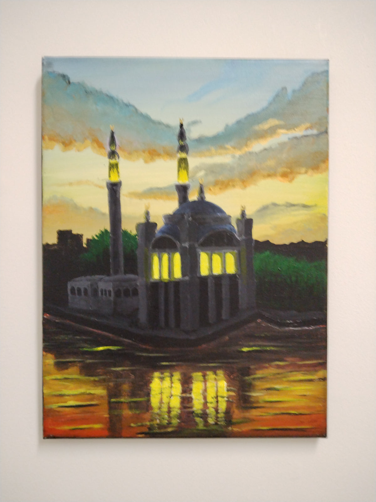 Ortakoy Masjid original painting by Ian Garrett showcasing stunning colors and reflections on water hung on a white wall.