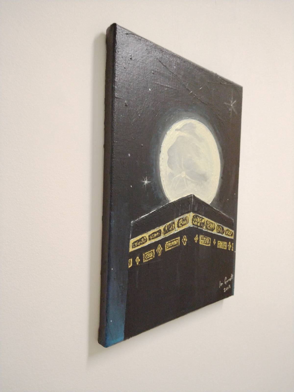 Side view of Lailatul Qadr (Night of Power) - Original acrylic painting on canvas. by Ian Garrett hung on a white wall.