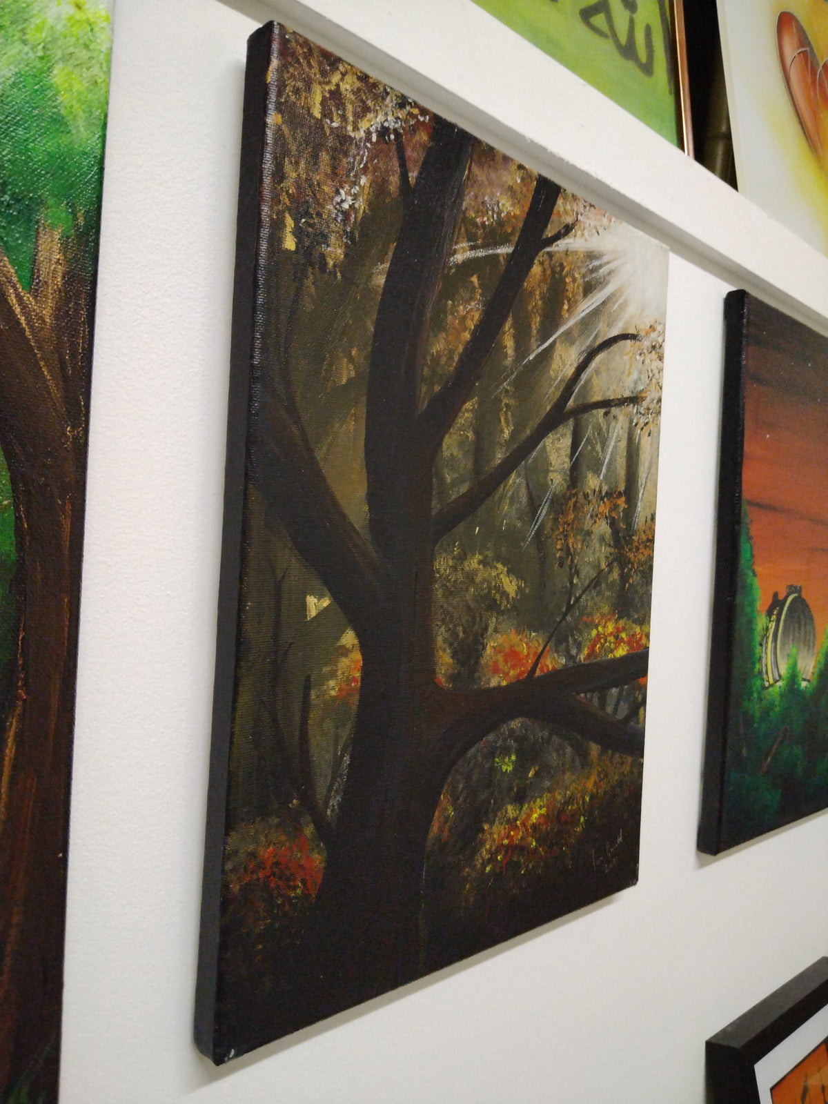 Autumn Forest painting featuring dramatic trees and vibrant fall colors by Ian Garrett.