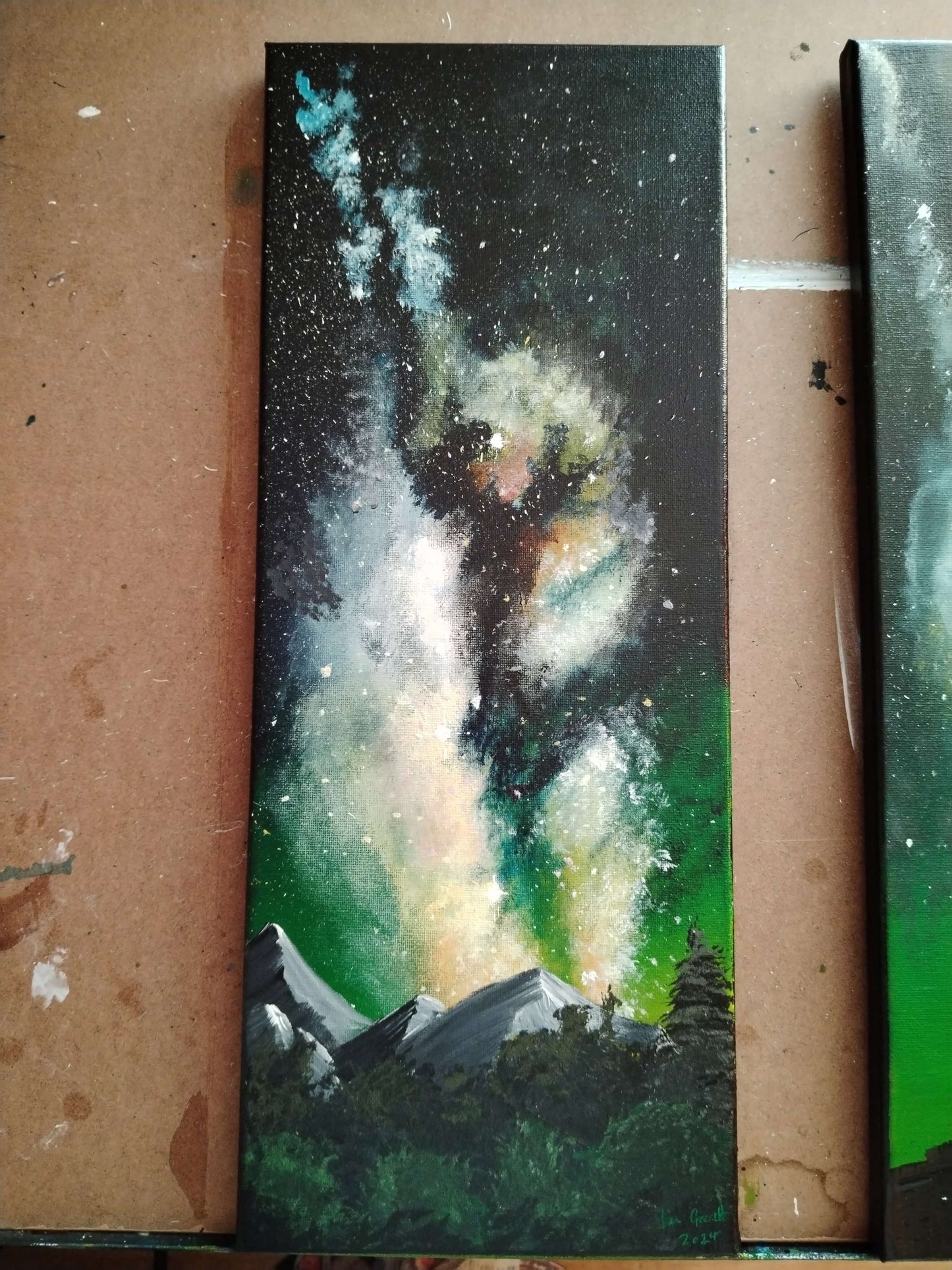 Milkyway over the Mountains©Ian Garrett 2024. Acrylic on Canvas 8 x 20 inches.